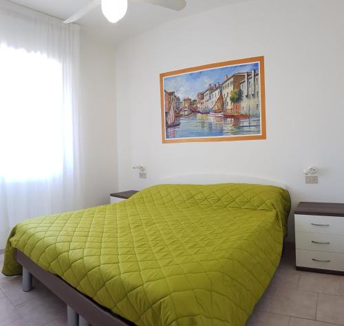 Säng eller sängar i ett rum på Residence Nova Marina