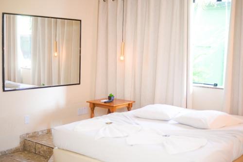 מיטה או מיטות בחדר ב-Hotel Luma