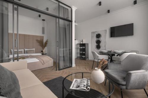 Televízia a/alebo spoločenská miestnosť v ubytovaní APARTIO ROOMS Katowice