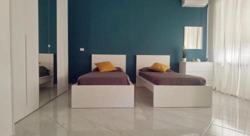 Letto o letti in una camera di A Due Passi dal Mare B&B