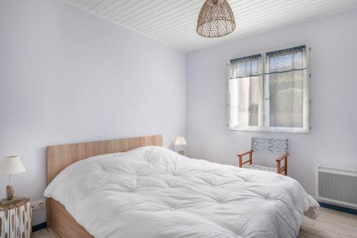 En eller flere senge i et værelse på À moins de 300m de la mer, maison cosy pour 4