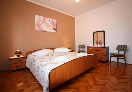 Postel nebo postele na pokoji v ubytování Apartment Fero with beautiful garden