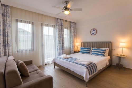 Postel nebo postele na pokoji v ubytování Mavi Deniz Konuk Evi