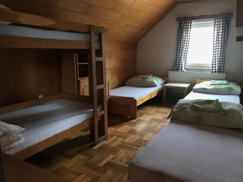 Voodi või voodid majutusasutuse Chata Svojáč toas