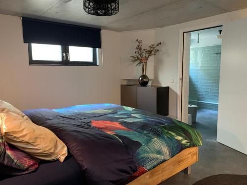 Tempat tidur dalam kamar di Strand & meer