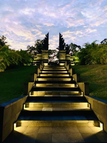 a set of stairs with lights in a park at La Coralina Island House in Bocas del Toro