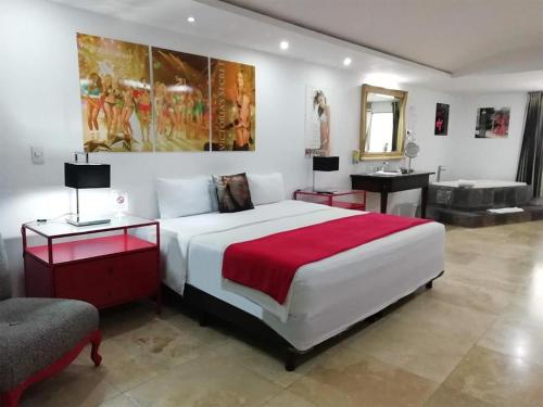 Tempat tidur dalam kamar di Essenzia de Cancun