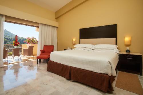 Barceló Puerto Vallarta - All Inclusiveにあるベッド
