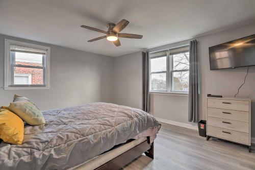 a bedroom with a bed and a ceiling fan at Family-Friendly Getaway 11 Mi to Dtwn Philly in Philadelphia