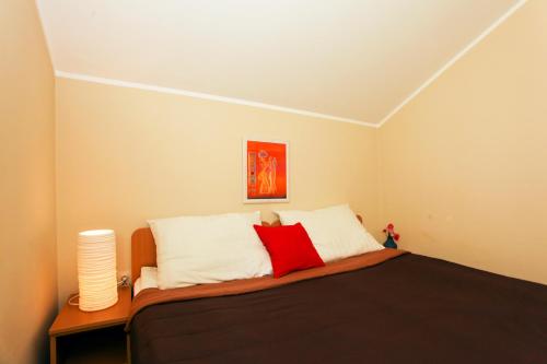 Кровать или кровати в номере Apartments Izvor