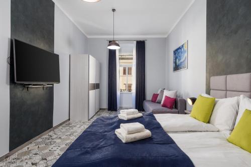 Кровать или кровати в номере Apartments Piccola Venezia