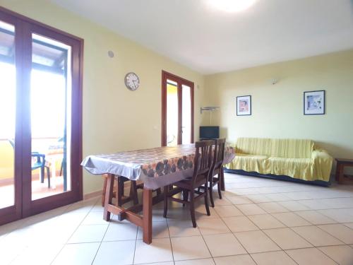 A seating area at Santa Teresa Sea View apartment - Private Parking & WiFi