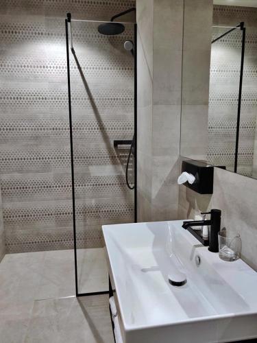 Ванная комната в Vvinn Hotel