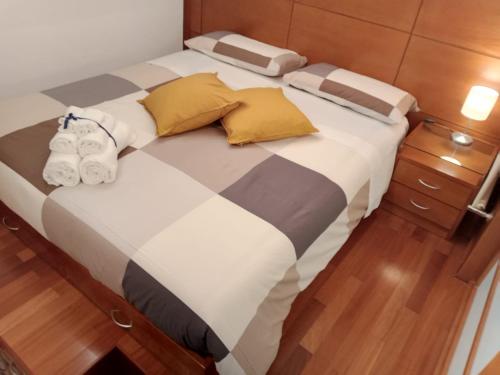 Postel nebo postele na pokoji v ubytování La casa del vicolo - Taormina centro