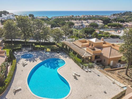 an overhead view of a swimming pool at a resort at Villa Balaia by HelloVacations in Albufeira