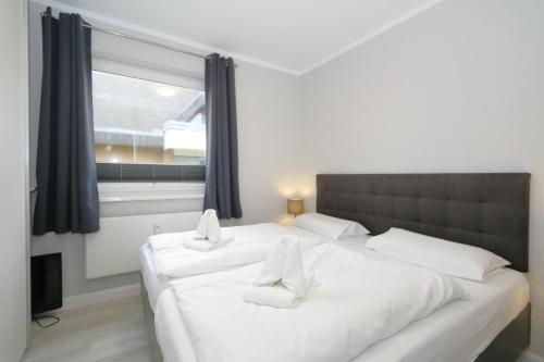 Кровать или кровати в номере Widlak