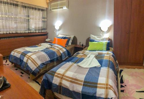 Room in Guest room - Hotel Square Skopje Macedonia 객실 침대