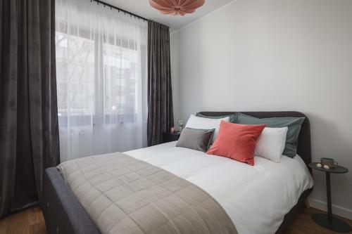 Кровать или кровати в номере TS New Town Apartments