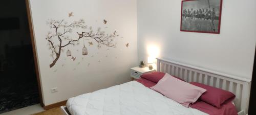 Una cama o camas en una habitación de Appartameto Casa Summano