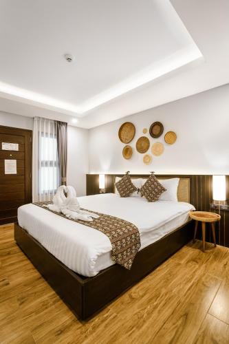 Katil atau katil-katil dalam bilik di Paraiso Hotel Chiangmai