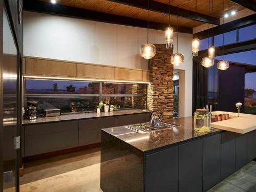 a kitchen with a sink and a counter top at Letlapa Metsi in Denysville