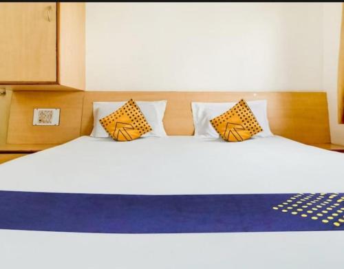Postel nebo postele na pokoji v ubytování Hotel Rahi