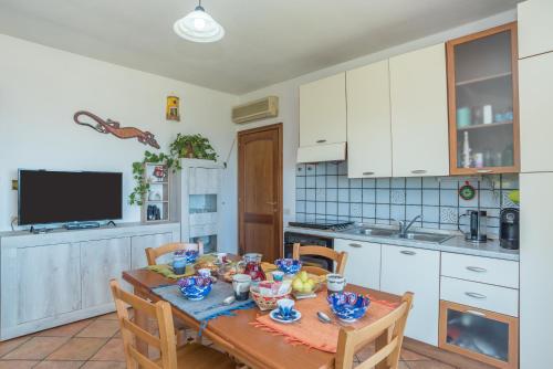 Kuchyň nebo kuchyňský kout v ubytování Appartamento di Molly