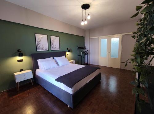 Ένα ή περισσότερα κρεβάτια σε δωμάτιο στο Beautifull And Airy Appartment Corfu Town