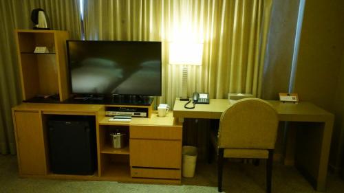 Телевизор и/или развлекательный центр в City Suites-Taipei Nanxi