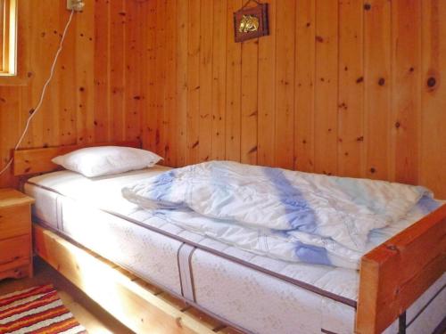 Un pat sau paturi într-o cameră la Holiday home STRYN III