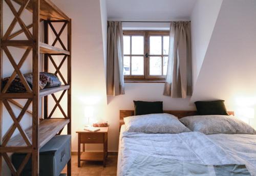 Llit o llits en una habitació de Appartements Adam-Mühle