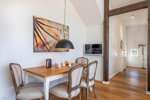 Televisyen dan/atau pusat hiburan di HofGut Bockelkathen Apartment 1