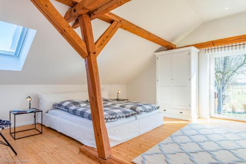 Ένα ή περισσότερα κρεβάτια σε δωμάτιο στο HofGut Bockelkathen Apartment 7