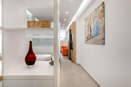 Posteľ alebo postele v izbe v ubytovaní New Luxury Studio in the Heart of Thiseio.