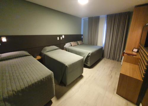 Sky Palace Hotelにあるベッド
