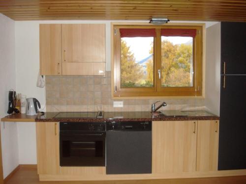 Kuchyň nebo kuchyňský kout v ubytování Chalet Lucille