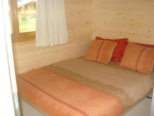 Postel nebo postele na pokoji v ubytování Chalet Lucille