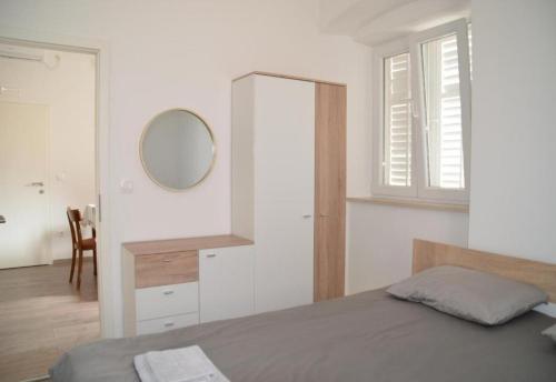 Posteľ alebo postele v izbe v ubytovaní PK Apartments - Dubrovnik