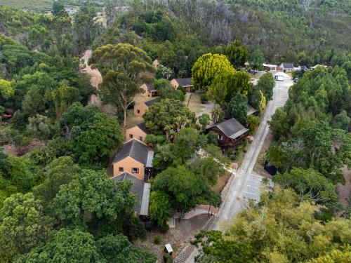 an aerial view of a house in a forest at Gooderson Knysna Chalets in Knysna