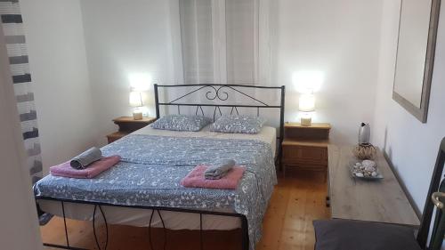 Ένα ή περισσότερα κρεβάτια σε δωμάτιο στο Bei Kosta