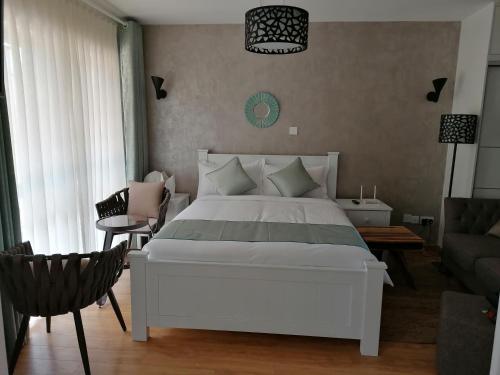 Llit o llits en una habitació de Soho Studio Apartment