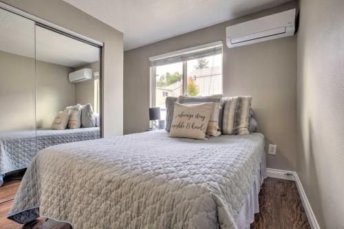 a bedroom with a bed with a pillow on it at Relaxing Poway Abode Near Parks and Wineries! in Poway
