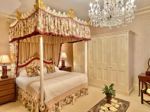 En eller flere senge i et værelse på Beryl Country House