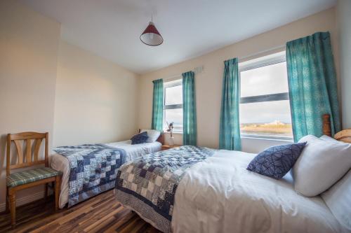 Postel nebo postele na pokoji v ubytování Ocean View - 2 Bedroom Townhouse