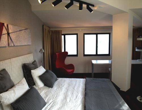 Ένα ή περισσότερα κρεβάτια σε δωμάτιο στο Hotel Lastres Miramar