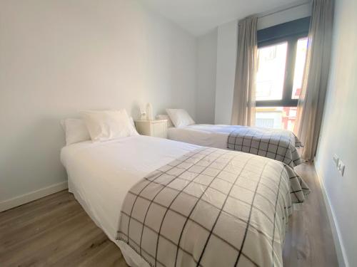 Ένα ή περισσότερα κρεβάτια σε δωμάτιο στο Casa Jazmín