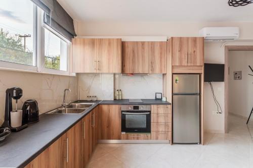 Kuchyň nebo kuchyňský kout v ubytování Kelly's Sunset Apartment 2 Kalamata