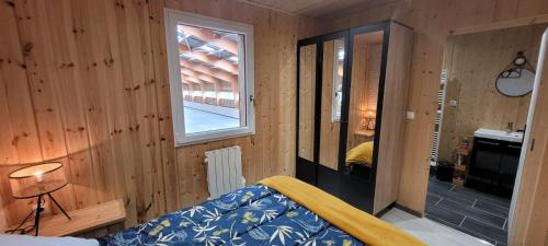Postel nebo postele na pokoji v ubytování gîte du haras