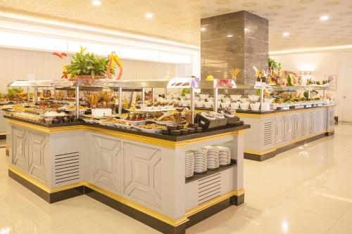 a buffet line with a lot of food on display at Orange Palace Side - All Inclusive in Side