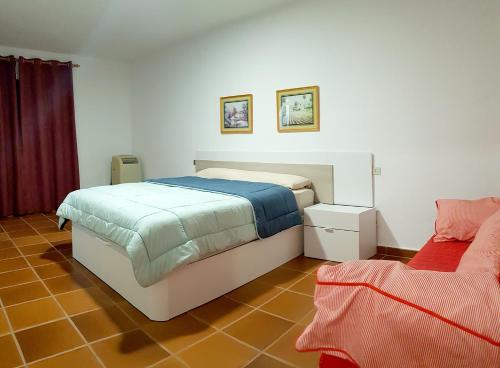 Postel nebo postele na pokoji v ubytování APARTAMENTO MAYI 2
